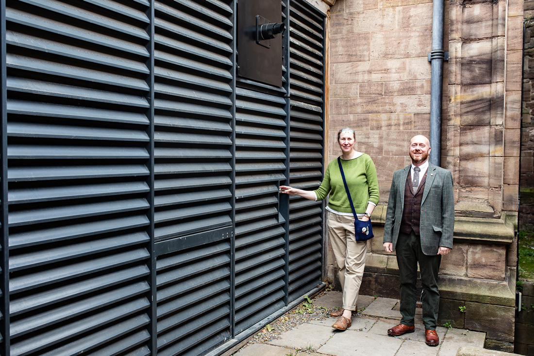 Elizabeth Semper O’Keefe (Cathedral Archivist) and Alan Cartwright (Head of Estates) outside the newly updated plant room. Credit Caroline Potter
